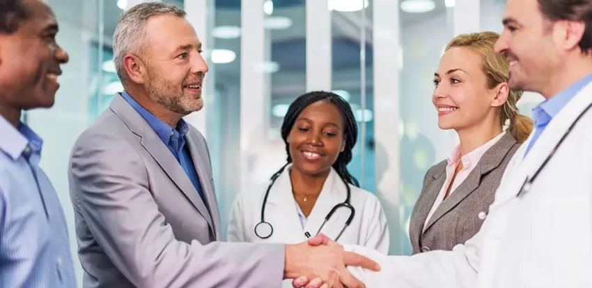 Happy business people and doctors came to an agreement.